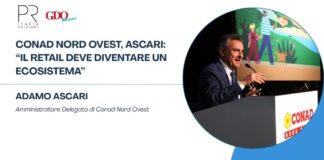 Header banner: 'Conad Nord Ovest, Ascari: Il retail deve diventare un ecosistema' with Adamo Ascari speaking at a podium (round photo on the right).