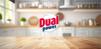 Dual Power logo centered above a wooden kitchen table with the text 'Welcome Home' in the foreground.