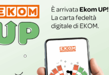 Promotional banner for EKOM UP app showing a smartphone with EKOM branding and Italian text about a digital loyalty card (È arrivata Ekom UP!).
