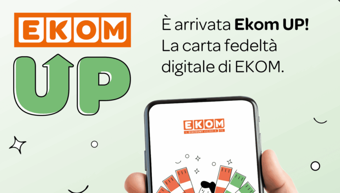 Promotional banner for EKOM UP app showing a smartphone with EKOM branding and Italian text about a digital loyalty card (È arrivata Ekom UP!).