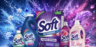 Assorted Soft laundry detergents and fabric softener bottles in blue, pink, and purple with lavender-themed packaging against a colorful splash background.