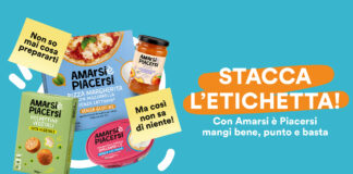 Colorful Italian ad for Amarsi è Piacersi; boxed pasta, jar sauce and snacks on a teal background with bold orange banner text STACCA L'ETICHETTA!