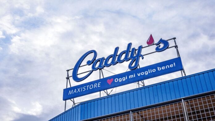 CADDYS OPENING (INSEGNA) Store sign reading