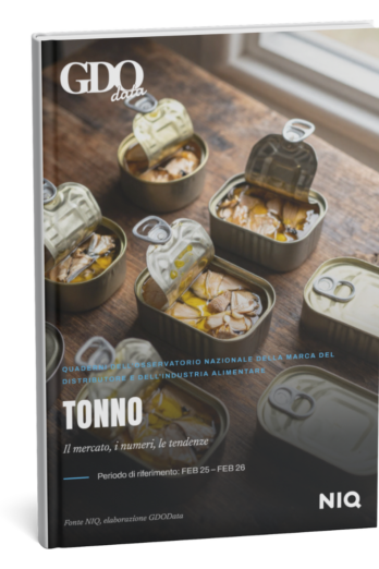 Magazine cover showing opened tuna cans on a wooden surface, with 'TONNO' prominent and 'GDo data' branding at the top left