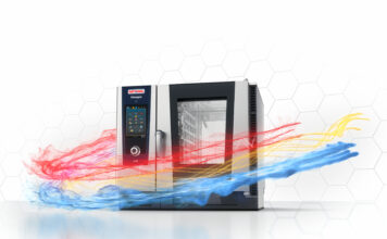 RATIONAL premiata ai Barawards con iHexagon e Digital Service Management RATIONAL iHexagon commercial oven with a touch-screen panel and stainless steel body, set against a hexagon-pattern background.