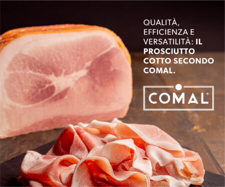 Chunk of ham with thin-sliced prosciutto in the foreground and the COMAL logo with Italian slogan on the right side.