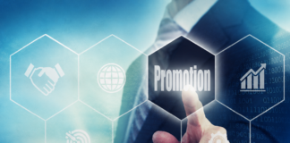Promotional poster in Italian reading 'L'Evoluzione della Pressione' and 'Promozionale nel 2026 - Primo Semestre', with a hand pointing at a 'Promotion' icon among hexagonal graphics (handshake, globe, target).