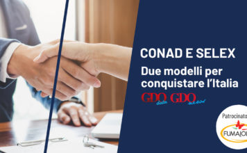 Selex e Conad: due modelli per conquistare l’Italia Handshake between two people on a business banner about CONAD and SELEX sponsorships.