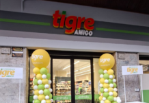 Gruppo Gabrielli rafforza la presenza a Roma con il format Tigre Amico Storefront of Tigre Amico supermarket with yellow/green balloon columns framing the entrance.