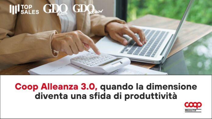 Person typing on a laptop while using a calculator on a desk; logos 'Top Sales', 'GDO data', 'GDO news' appear in the top-left.