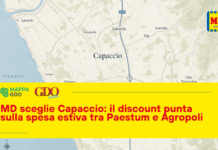 Map of the Capaccio area with a large yellow promotional banner advertising MD's summer discount between Paestum and Agropoli.