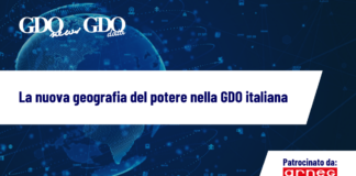 La nuova geografia del potere nella GDO italiana Banner featuring the title 'La nuova geografia del potere nella GDO italiana' on a blue tech background with sponsor 'Patrocinato da: arneg' logo.